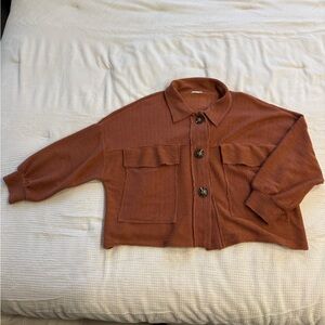 Oversized textured sweater with button front